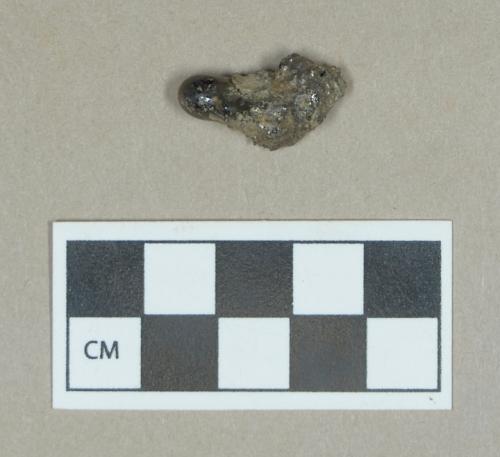 Metal, slag fragment