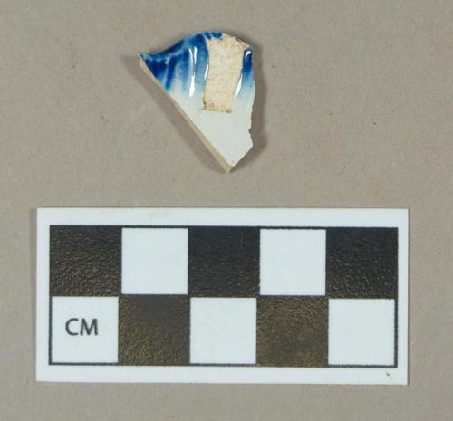 Ceramic, blue shell edge pearlware rim sherd