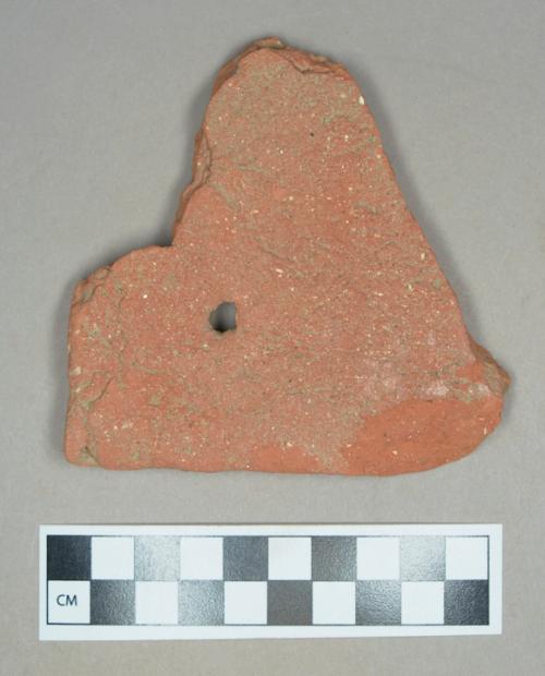 Ceramic/architectural, roof tile fragment with nail hole