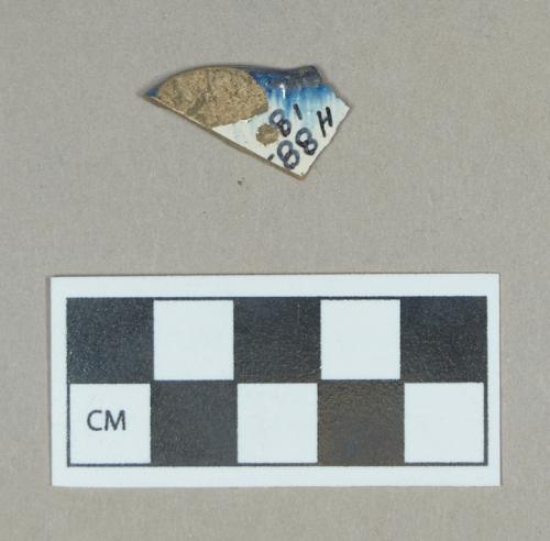 Ceramic, blue shell edge pearlware rim sherd