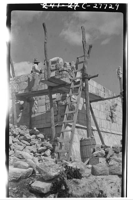 Restoring mask panel at the Temple of Warriors