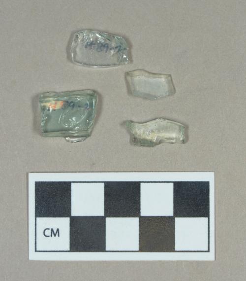 Glass, aqua curved body fragments