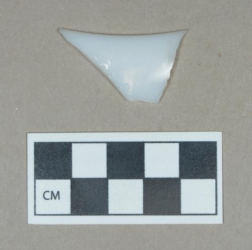 Glass, opaque white/milk glass rim/edge fragment