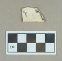 Ceramic, refined earthenware base sherd, brown transfer print