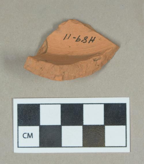 Ceramic, unglazed redware base sherd