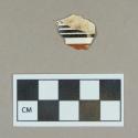 Ceramic, factory slip decorated creamware body sherd