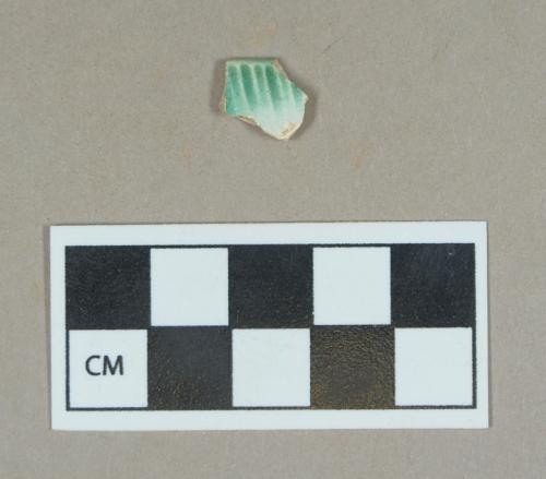 Ceramic, green shell edge pearlware rim sherd