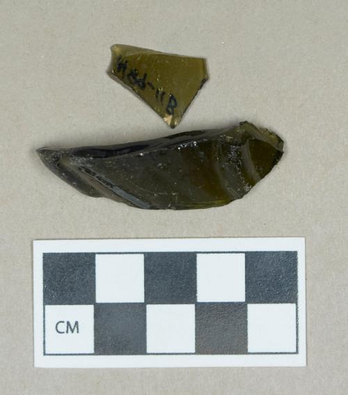 Glass, olive green curved body fragments