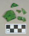 Glass, kelly green bottle body fragments