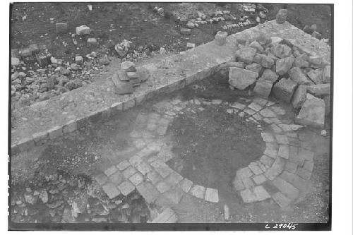 Caracol, Circular arrangment of stones, floor of upper terrace, SW corner.