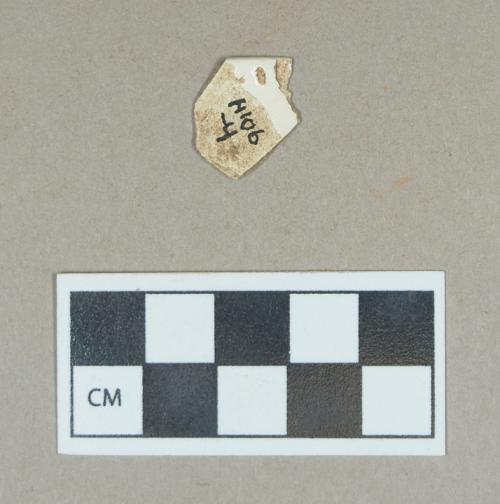 Ceramic, undecorated creamware rim sherd