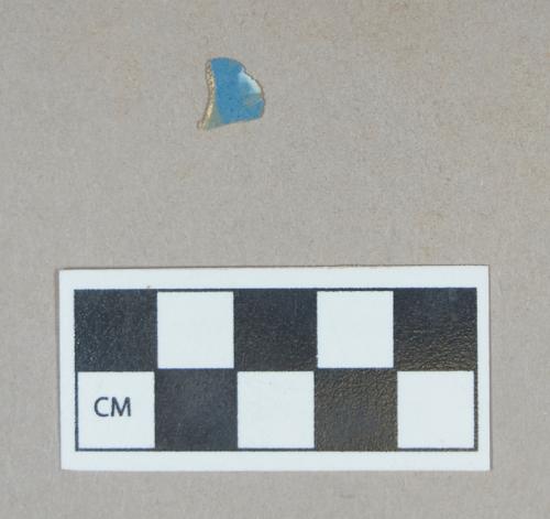 Ceramic, blue slip decorated pearlware body sherd