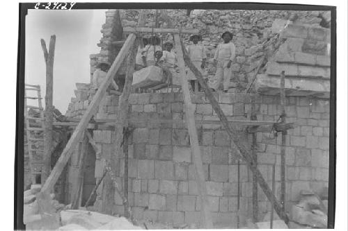 Caracol, repair of 5-member cornice E. side.