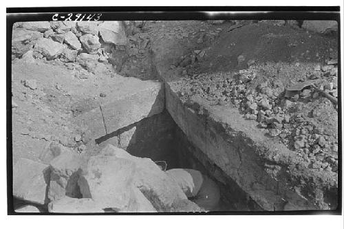 Caracol. Excavation of circular substructure, southside showing 1st cornice of f