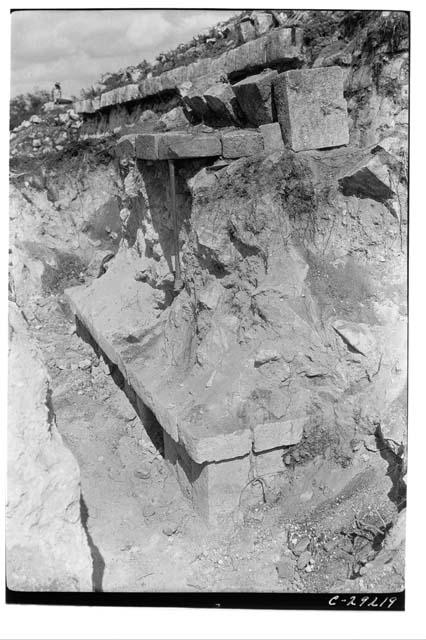 Caracol W. Annex. Fallen stones of stairway which led to roof of W. annex.