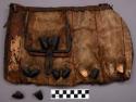 Deer fur bag, possibly Southeastern. Horizontal strips of leather on front
