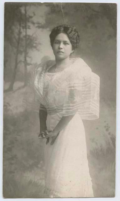 Postcard, image of woman, Paz Marquez, standing. William Cameron Forbes photograph albums of the Phillipines > Album 3