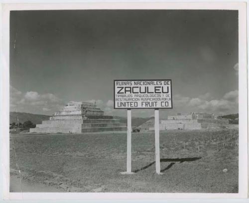 Outdoor image depicting a sign with United Fruit Co and Zaculeu in background