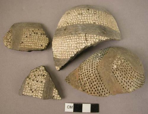 5 potsherds - black with white incisions