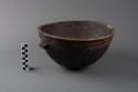 Black wood bowl, incised decoration