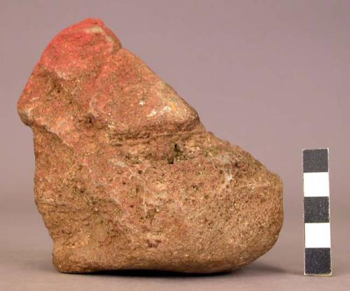 Raw material, chunk of quartz and other stone, both with red pigment