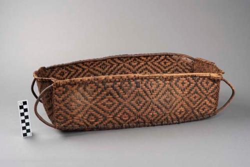 Carrying basket, 21.5" long x 6.5" wide