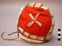 Cheyenne child's cap. Red flannel exterior decorated w/ dentalium shells