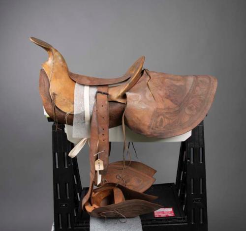 Saddle with stirrups