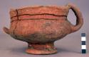 Heavy unpainted pottery incense burner, one handle broken off