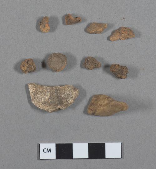 Stone fragments, likely non-cultural; ceramic, earthenware sherds