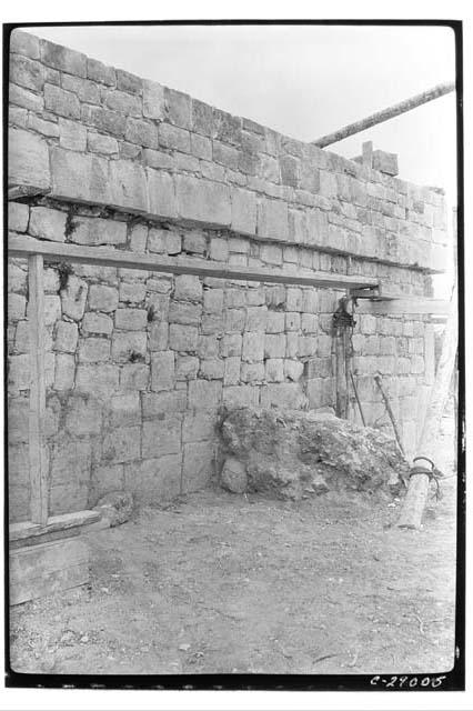 Caracol, S. side upper terrace showing incensario buried in debris.