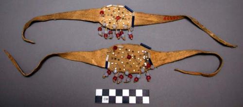 Woman's beaded buckskin 'teneka' or hair ribbon with pendants of beads