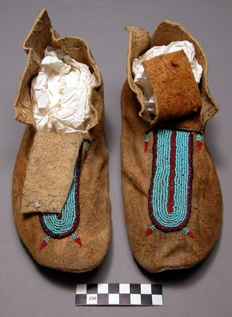 Pair of moccasins trimmed with blue beading