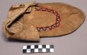 Moccasin possibly from the Great Basin. Soft sole and upper. Stitched up heel