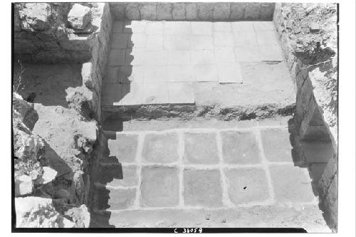 Struct. 3E3. Floor of chamber, some of the flagstones are in position, others we