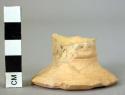 Pottery foot fragment - yellow minyan