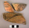 3 dark on light painted sherds