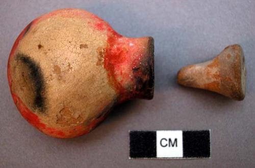 Pouch-shaped terra cotta bottle and stopper