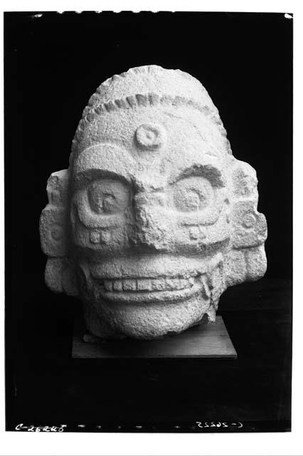 Temple of Little Heads, Old Chichen Itza. Carved stone head.