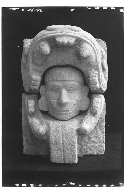 Human head in Serpent's mouth, from N. half of front facade, NW Colonnade