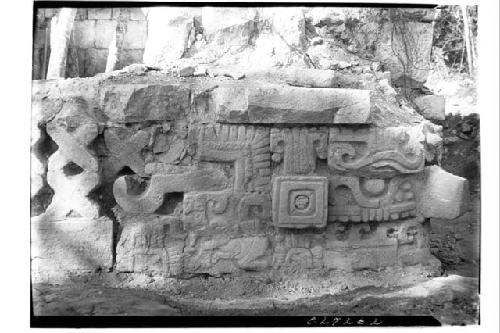 Mask panel at NW corner of platform supporting Temple of Three Lintels