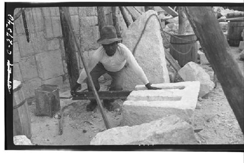 Caracol. Fitting I-beams in stone to be placed over N. doorway