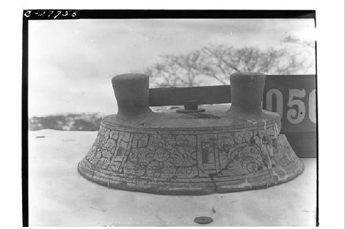 Tripod bowl, 3/4 complete, redware incised 4 holes drilled in side - S Temple ad