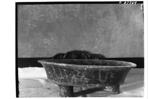 Tripod Bowl - red lacquer with painted rim - North Colonnade at base of Col. 22