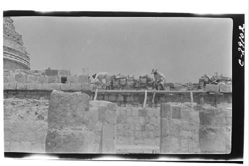 Caracol, repair of parapet first terrace, S. of stairway.