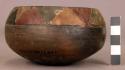 Small pottery bowl- border pf polychrome geometric design