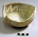 Portion of bowl, black on white ware