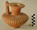 Sherds of fluted spout-handled extended neck jar