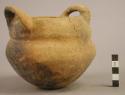 2-handled double-necked pottery vessel