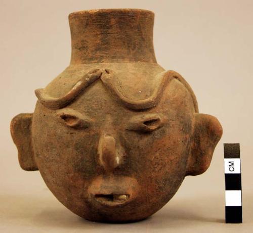 Pottery effigy head